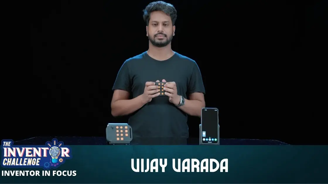 Vijay Raghav Varada on the Inventor Challenge set, a Braille device on the table in front of him.